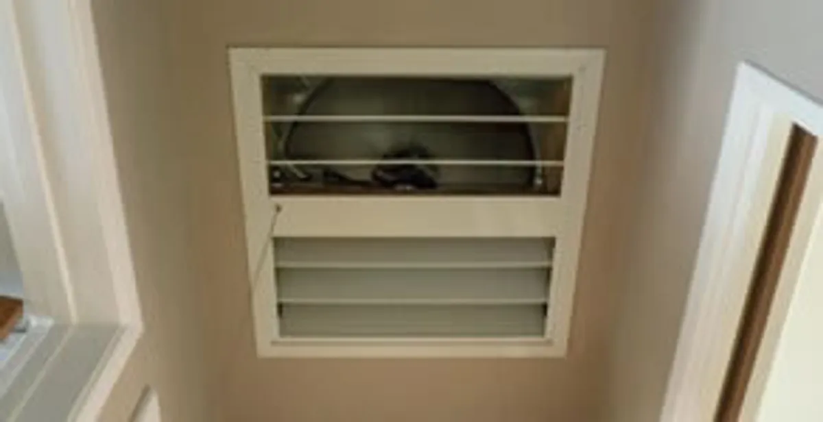 whole house fan installation services with ceiling-mounted ventilation system in Atlanta, GA